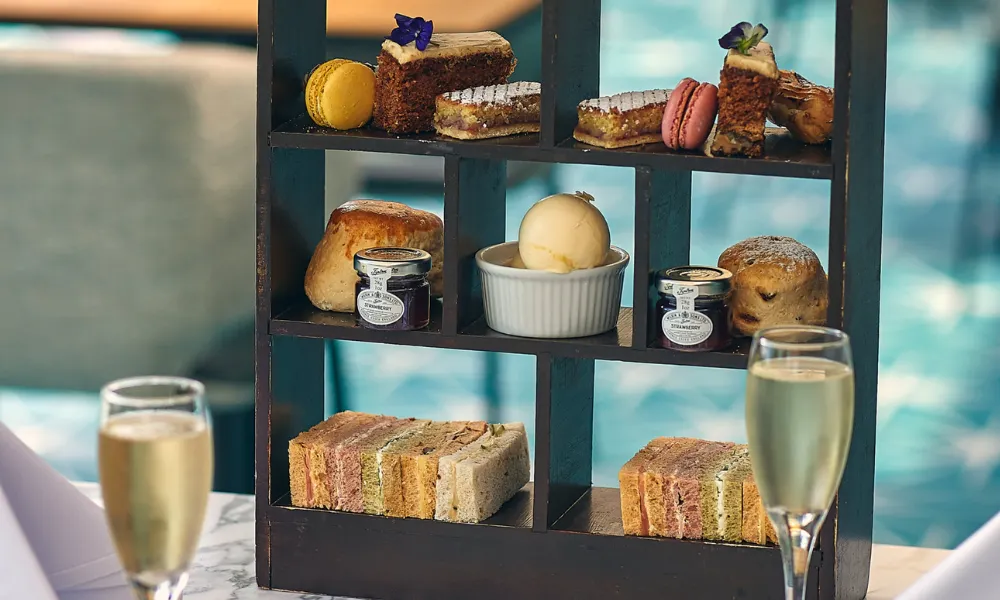 Sparkling afternoon tea served on shelf stand