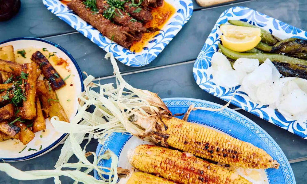 dishoom dishes on colourful plates