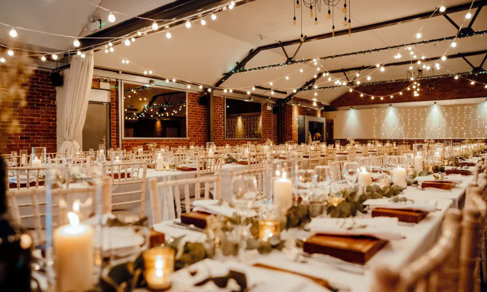 red brick space with wedding breakfast tables