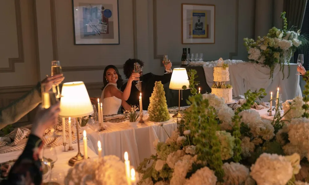 bride and groom doing toast at The Met wedding breakfast