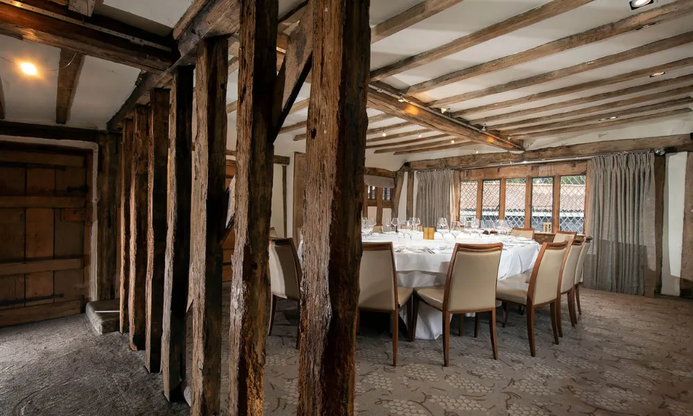 old wood beamed private dining room