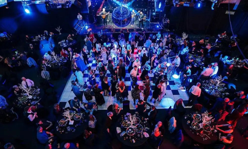 dancefloor at christmas party with guests dancing