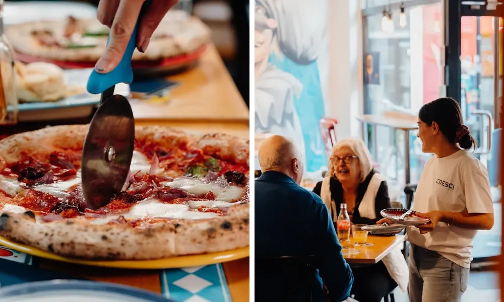 server talking to guests at pizza restaurant