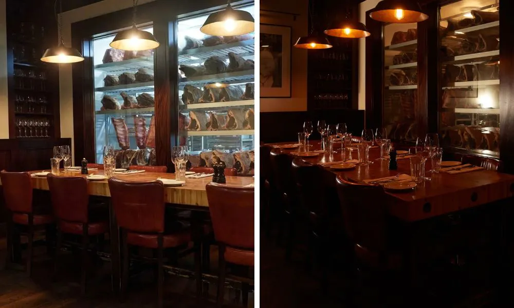 private dining room in steakhouse with view of dry aging room
