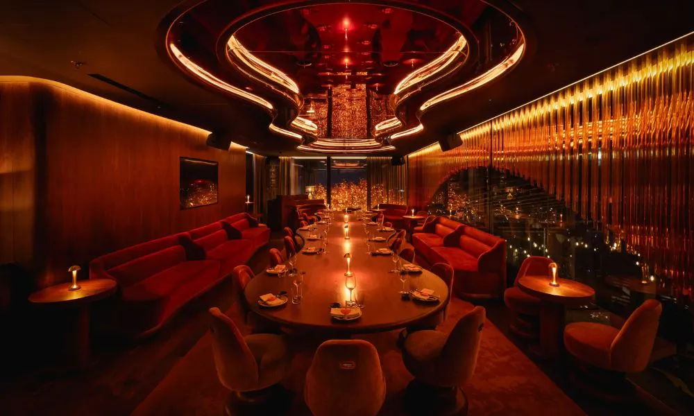 secluded private dining room with red seats and strobe lighting