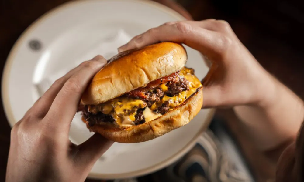 calfreezy burger with cheese bacon burger sauce and milk bun