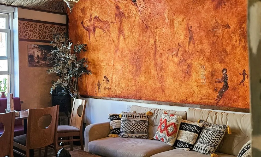 cave art wall hanging in turkish dining room