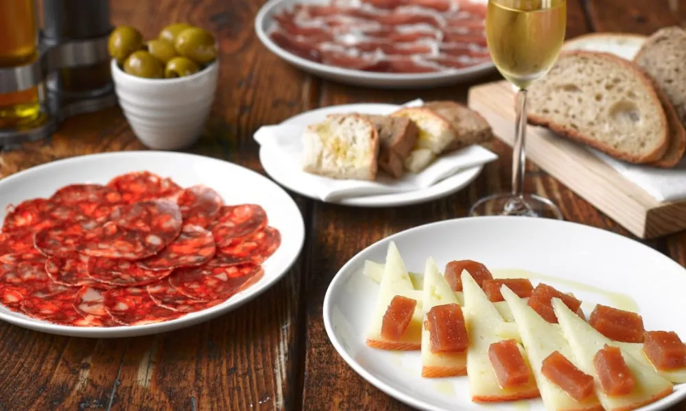 spanish jamon and cheeses at evuna