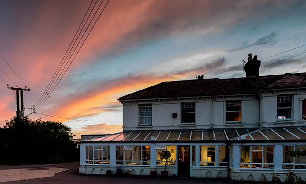 sunset at the sportsman in seasalter