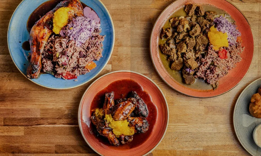 table with different Caribbean dishes