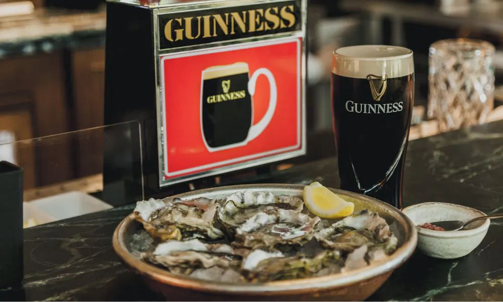 a platter of oysters and pint of guinness from darbys