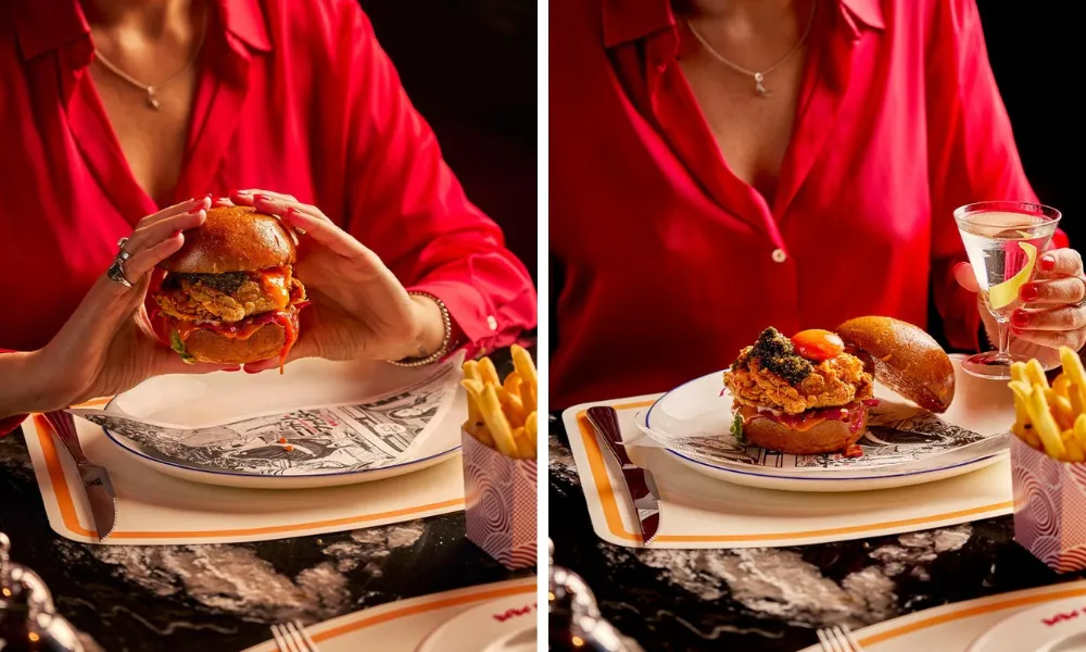 Burger with breaded chicken, egg yolk and caviar