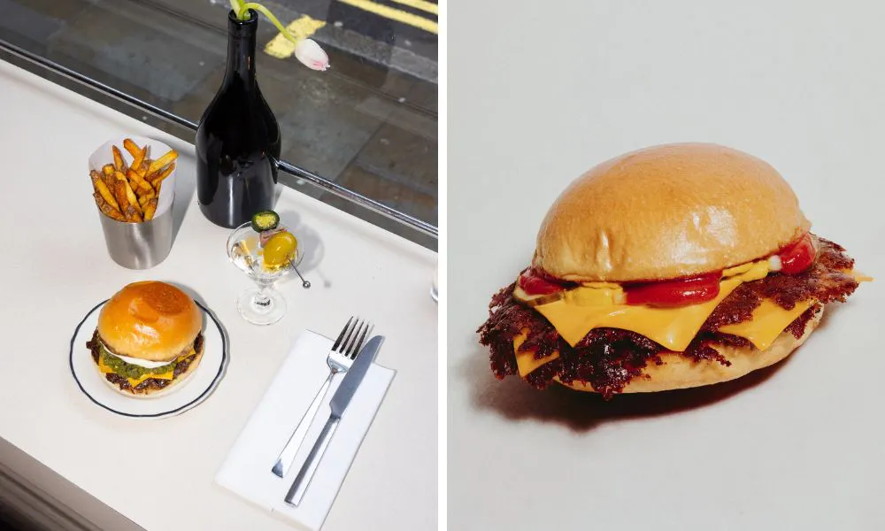 burger with martini and side of skinny fries in a restaurant window