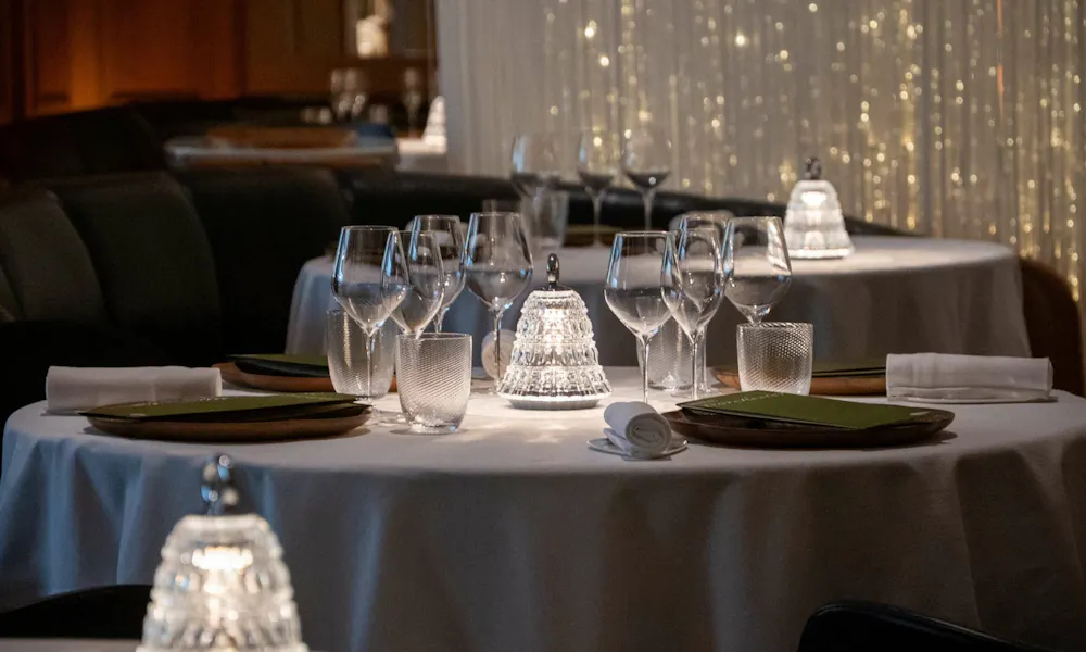 laid table for NYE at Alain Ducasse