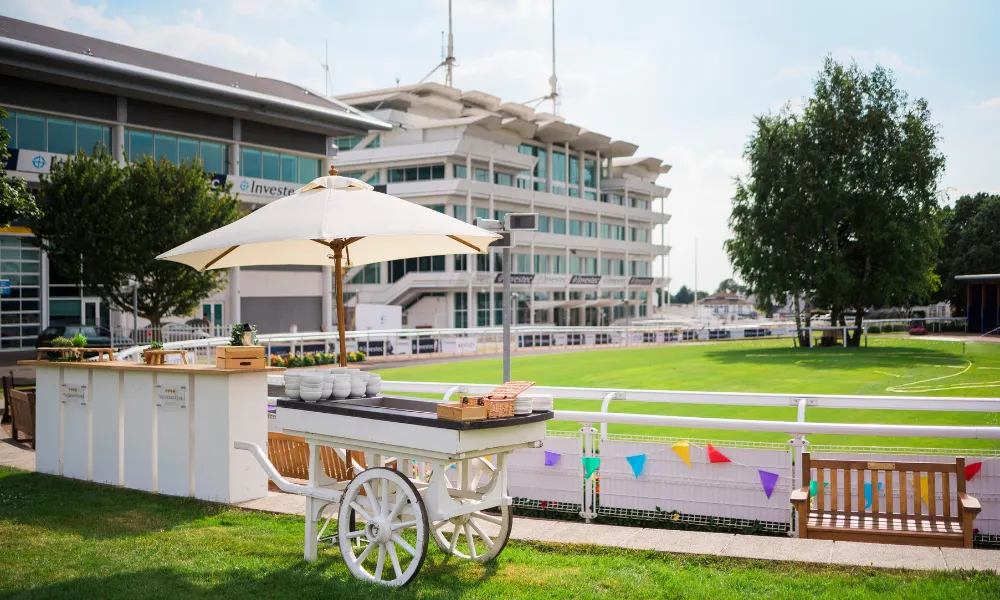 race course with a small cart serving food