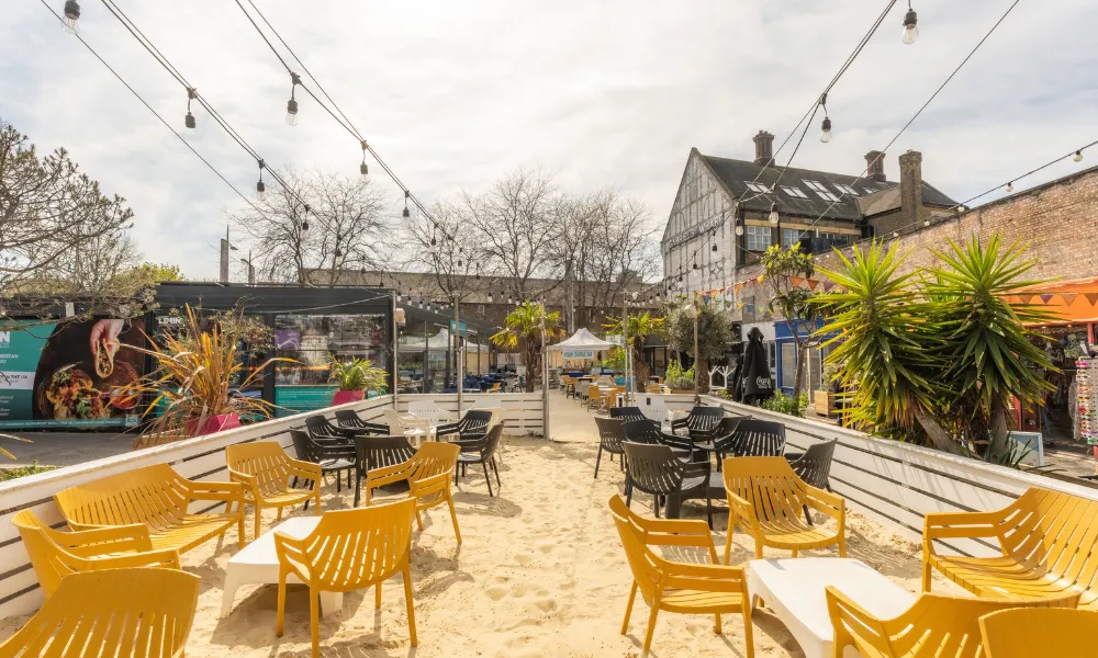 event venue with sand area and tables