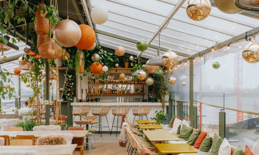 Covered rooftop restaurant with giant baubles