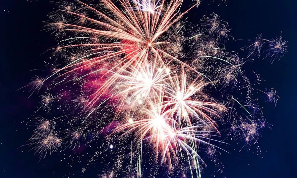 fireworks at night with pink colours