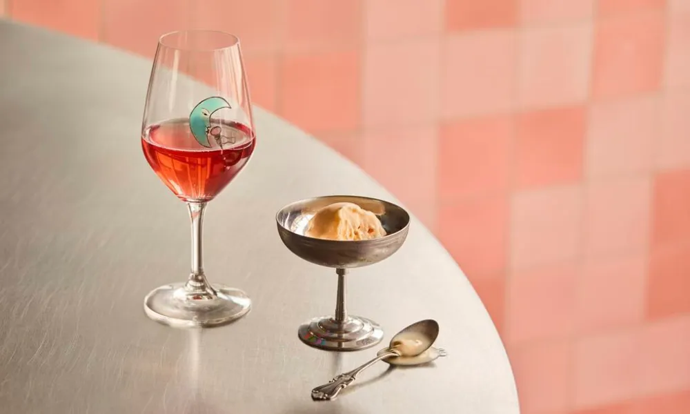 Scoop of ice cream and a glass of rose