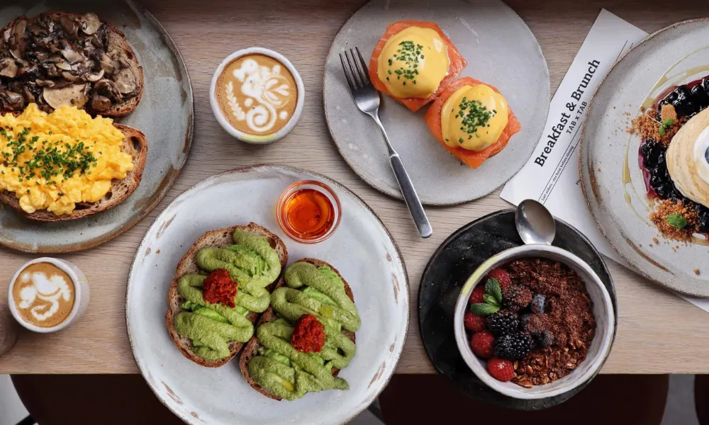 latte art and brunch plates with piped avocado toast