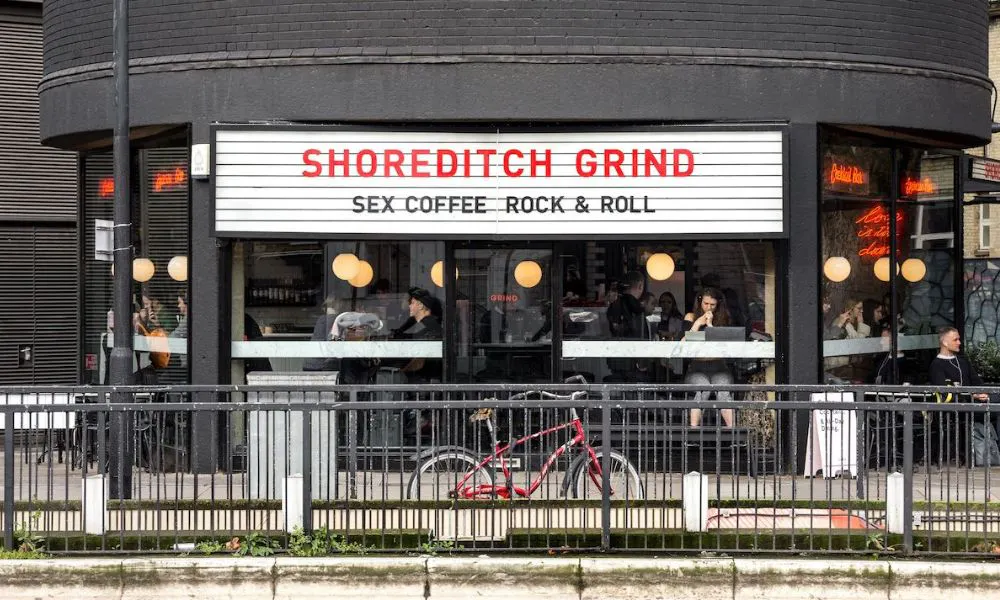 Shopfront with rainings and cinema-style sign