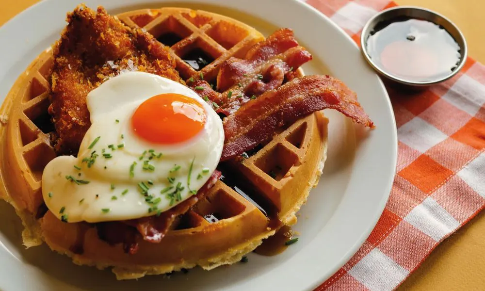 Breakfast waffle with bacon and egg
