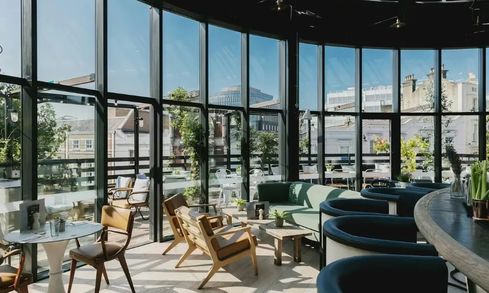 Glass restaurant with wraparound terrace