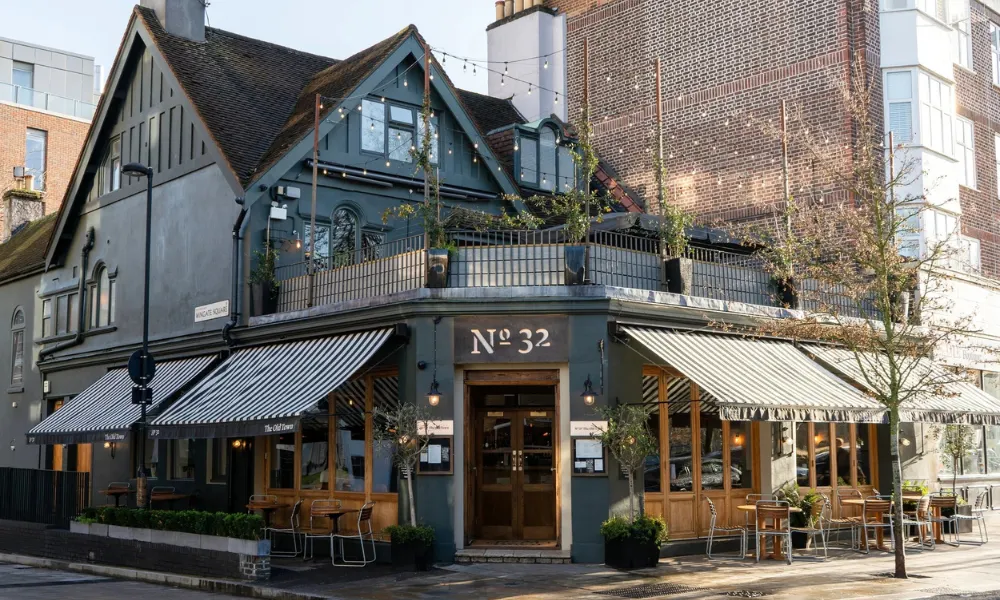 Pub with rooftop seating and string lights