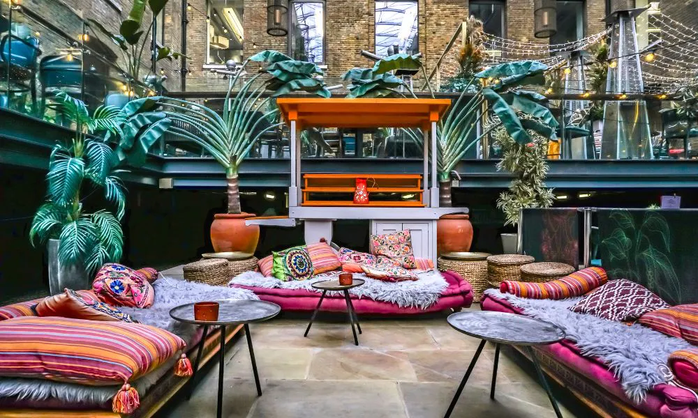 Vibrant outdoor terrace with sofas
