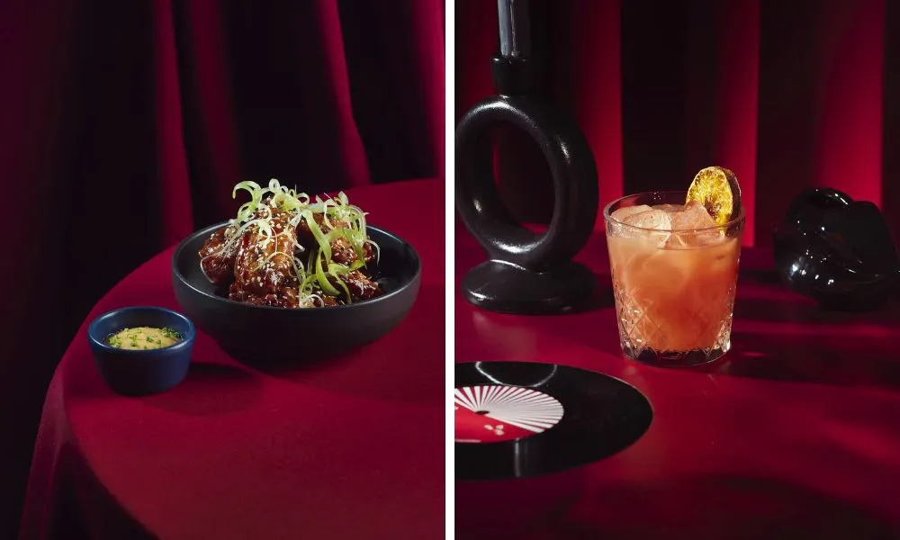 red velvet backdrop with cocktails and Asian cuisine