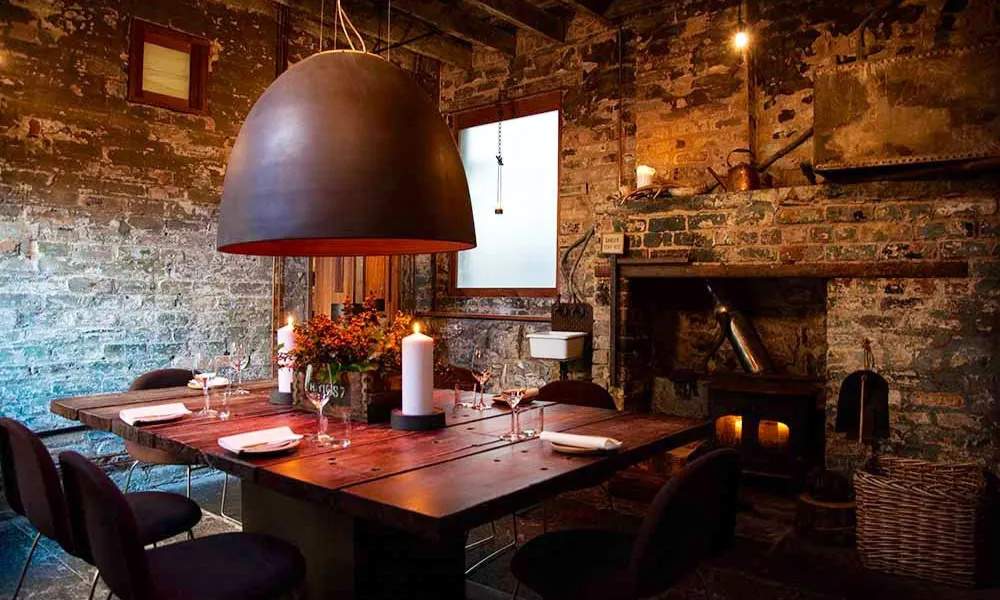 brick private dining room with candles