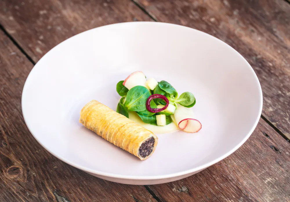Potato-wrapped Clonakilty black pudding with Cox apple pur&eacute;e at Myrtle