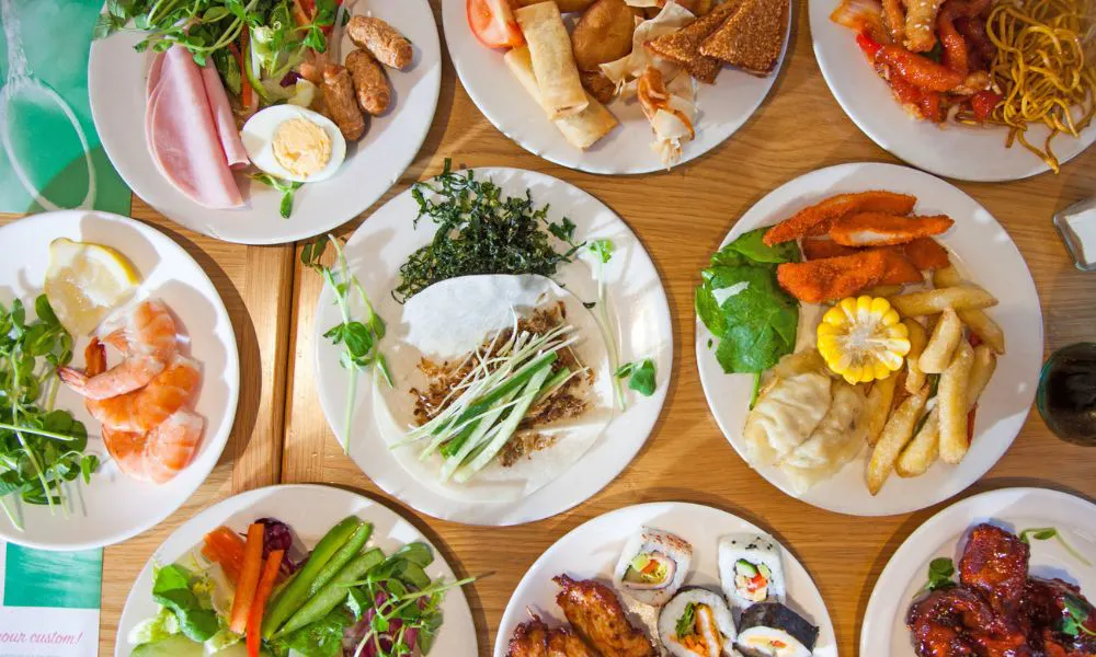 a birds eye view of a selection of Chinese cuisine on a table