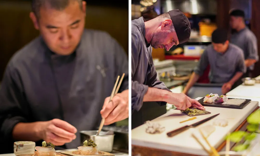 A sushi chef working at a counter