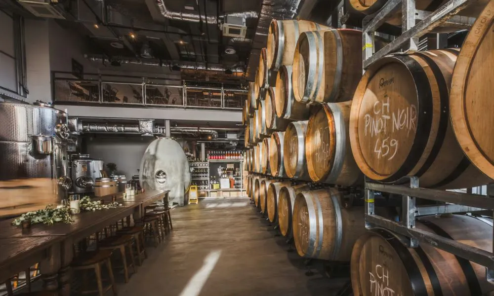 an event space featuring barrels of wine