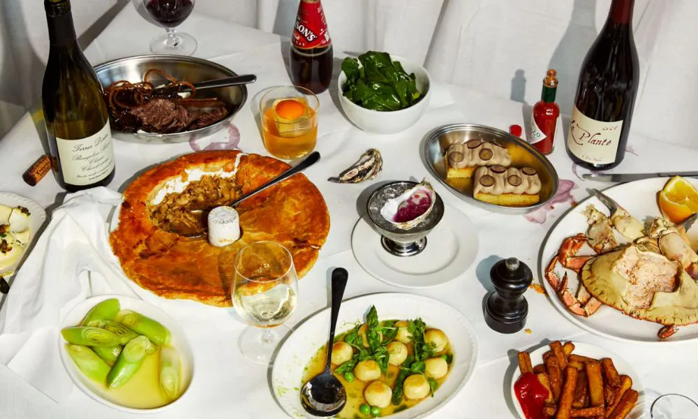 Pie, vegetables and wine bottles