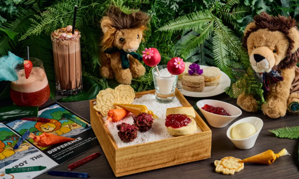 scones and lion biscuits with jungle foliage
