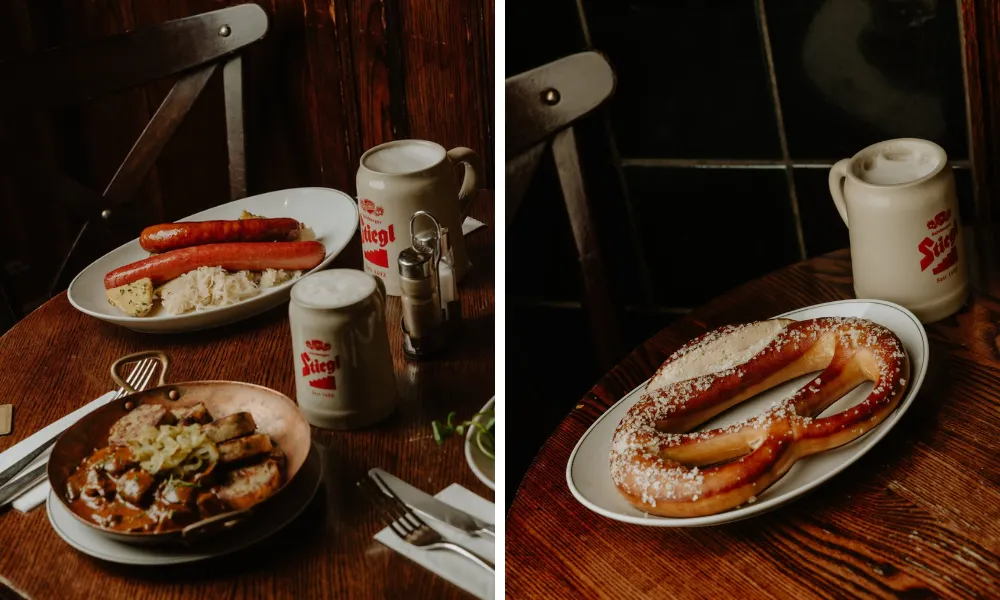 pretzel beer and bratwurst on a table