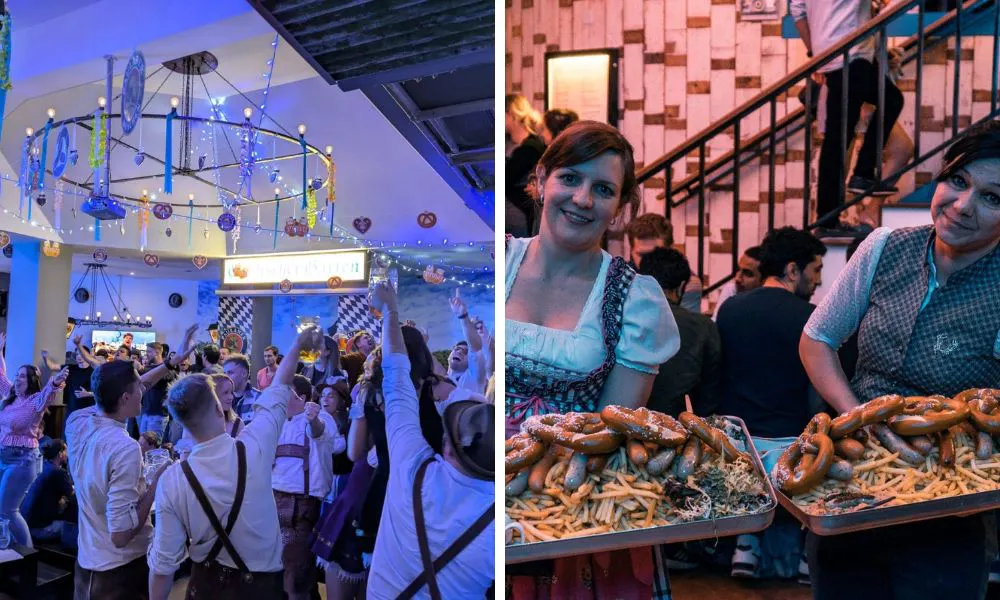 people partying at oktoberfest and waiters serving trays of german food