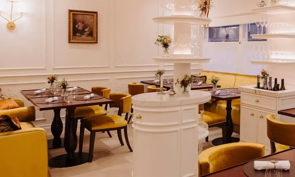 Interiors at Corenucopia, with yellow chairs