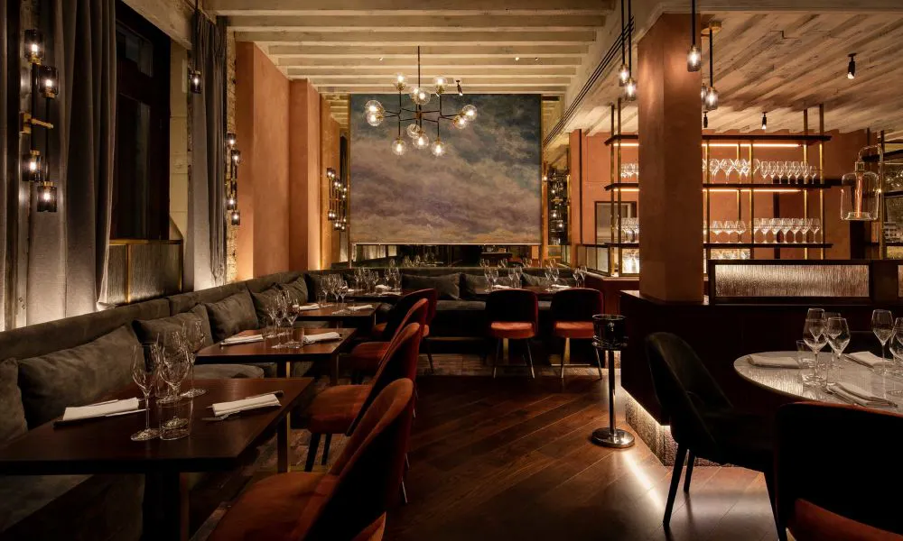 Moody dining room at Caractere
