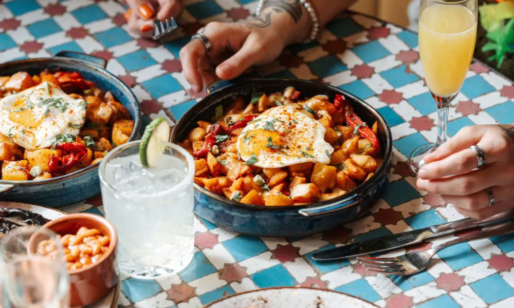 patatas bravas topped with a fried egg