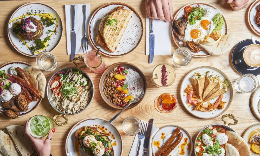 table laid out with mediterranean brunch plates