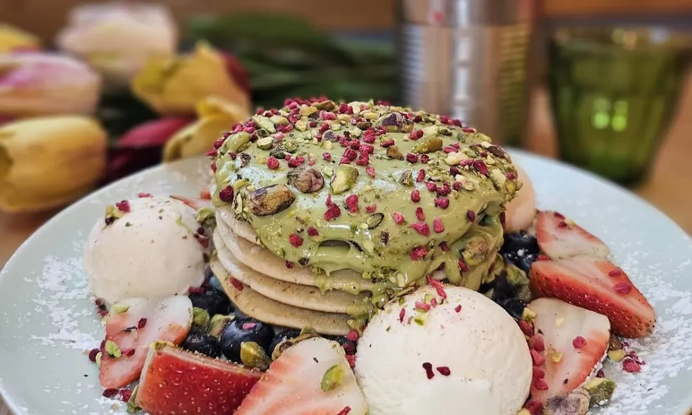 stack of pancakes with pistachio cream