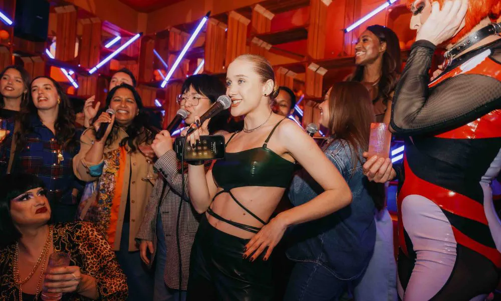 a group of people doing karaoke