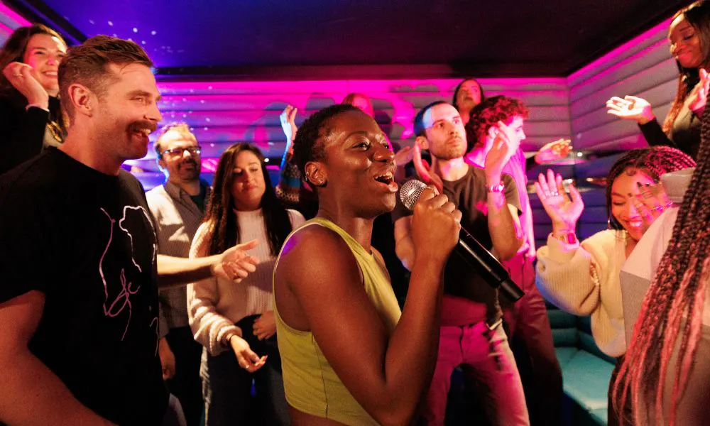 a group singing karaoke