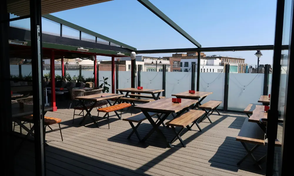 tables on the rooftop at And Then