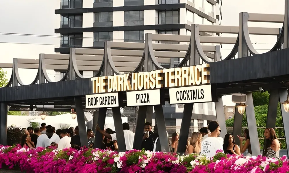 dark horse terrce with a big white sign