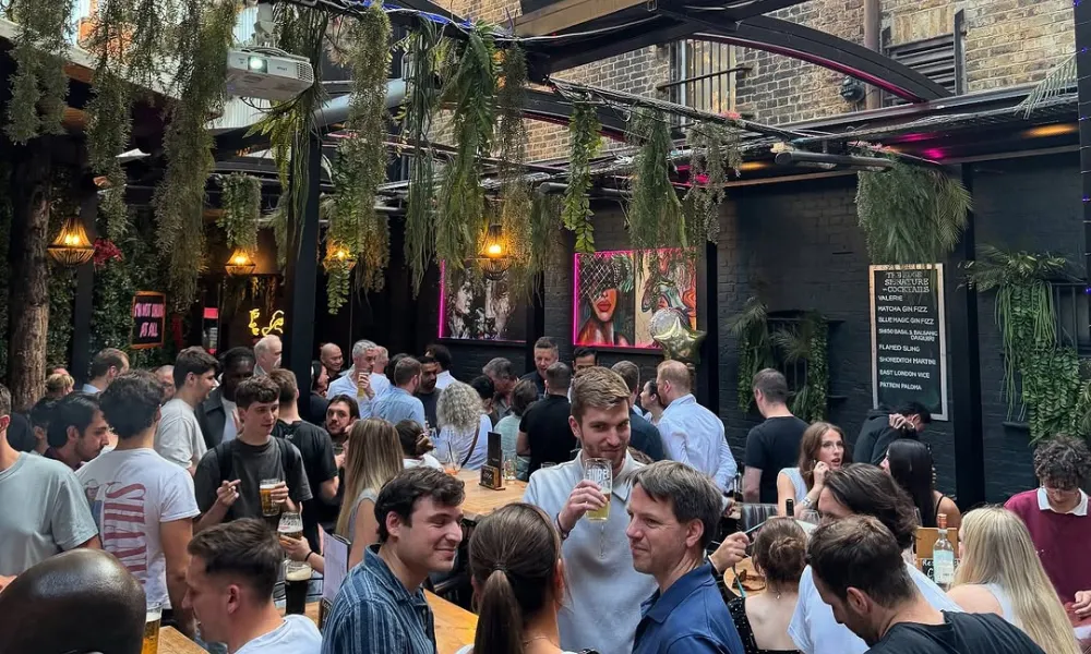 bus bar rooftop with lots of people drinking