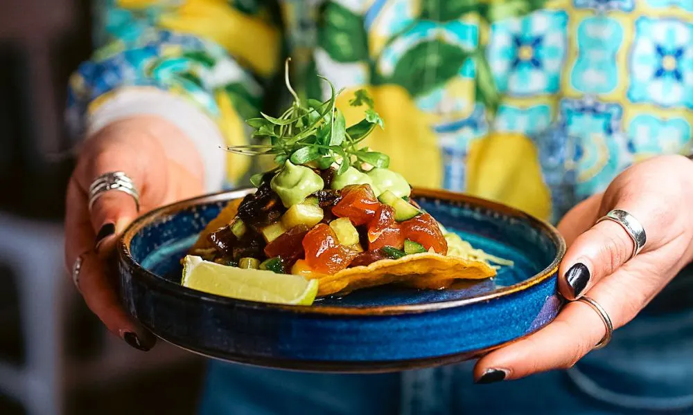 Taco with salsa and guacamole